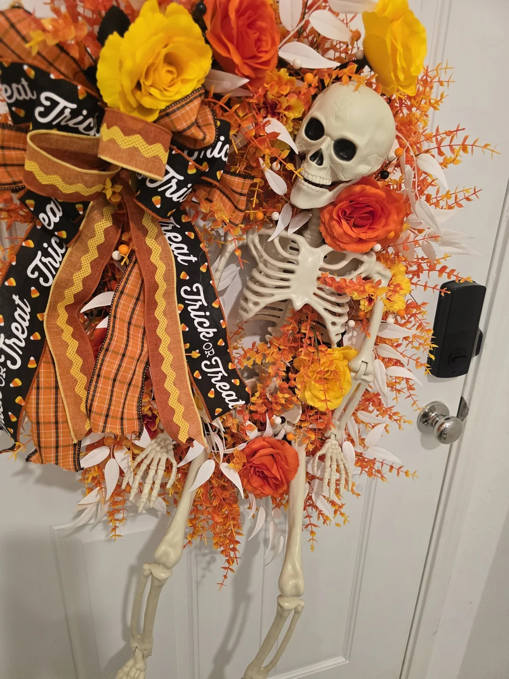Halloween Skeleton Wreath with Orange & Yellow Flowers Candy Corn